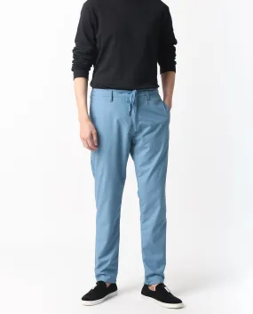Rare Rabbit Men's Aux Blue Solid Mid-Rise Regular Fit With Drawstring And Elastic Waistband Trouser